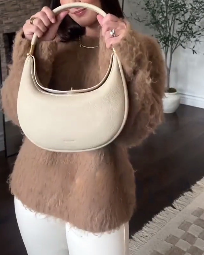 Effen kleur elegante halvemaanvormige schoudertas onder de arm