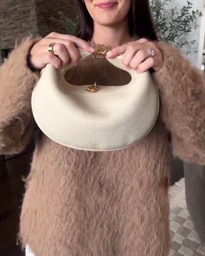 Effen kleur elegante halvemaanvormige schoudertas onder de arm